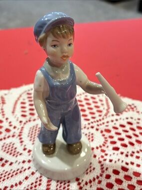 Vtg Porcelain Royal Dux Boy w Horn, produced by Royal Dutch Bohemia, Czech Co